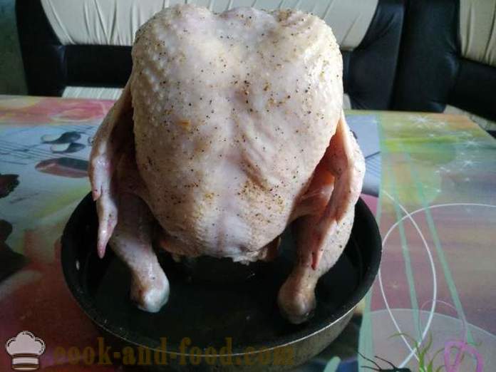 Gebackenes Huhn ganz auf der Bank - als köstliches gebackenes Huhn im Ofen insgesamt ein Schritt für Schritt Rezept Fotos
