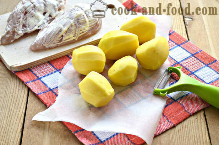 Gebackene Kartoffeln mit Huhn und Tomaten - wie Huhn im Ofen mit Kartoffeln backen, einen Schritt für Schritt Rezept Fotos