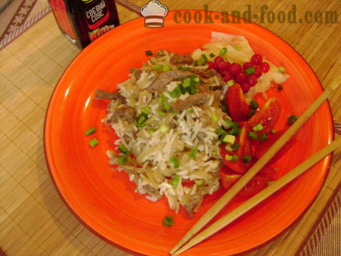 Reis mit Fleisch in Chinesisch - wie in einer Pfanne Reis mit Fleisch kochen, einen Schritt für Schritt Rezept Fotos