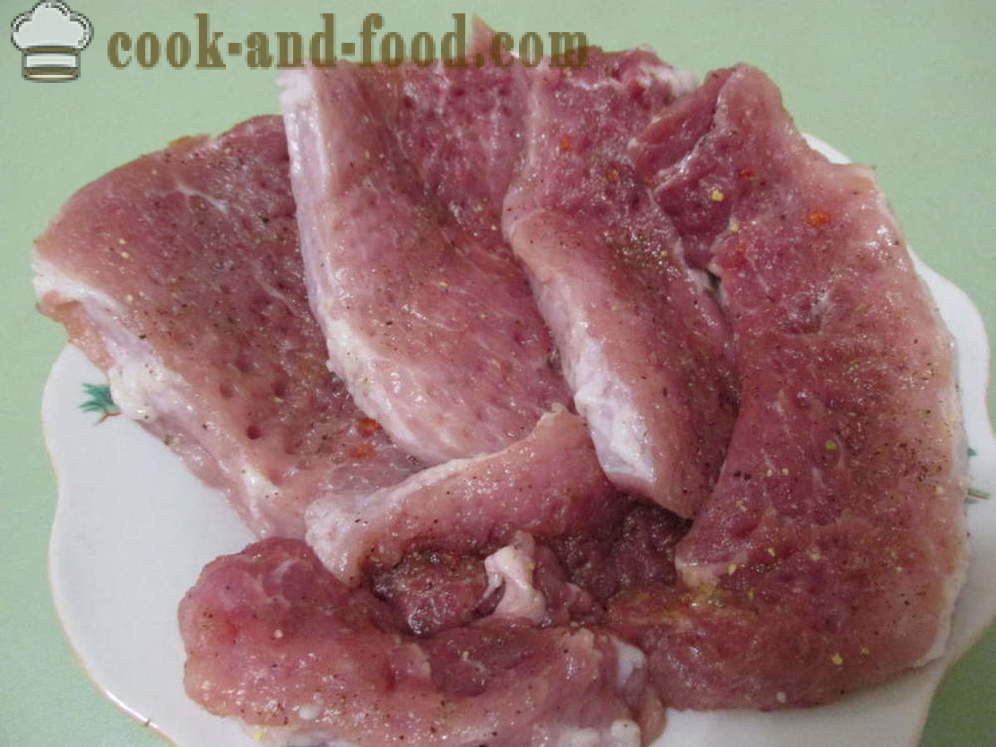 Saftige Schweinekoteletts im Ofen mit Käse Teig - wie Schweinekoteletts im Ofen zu kochen, mit einem Schritt für Schritt Rezept Fotos